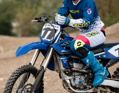 Person on a dirt bike wearing SIDI MX boots.