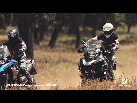 Load and play video in Gallery viewer, Bridgestone AX41 100/90-18 Front Tubeless Adventure Tyre (56P)
