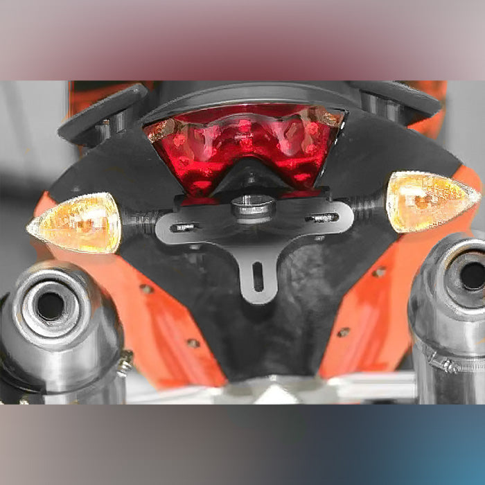 Load image into Gallery viewer, Tail Tidy/Licence Plate Holder! Suitable for the KTM 690 Duke III &#39;08-&#39;11 and the 690SM (all years), this Tail Tidy incorporates our replacement Tail Tidy light. Note: This Tail Tidy will not fit with &quot;hi-level Akrapovic&quot; exhaust and standard UK siz
